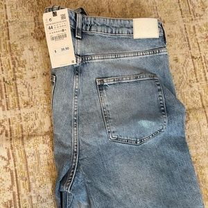 Zara High waisted distressed bell bottoms